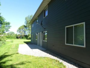 Ideal Twinhomes in Brookings, SD - Backyard with Back Patio