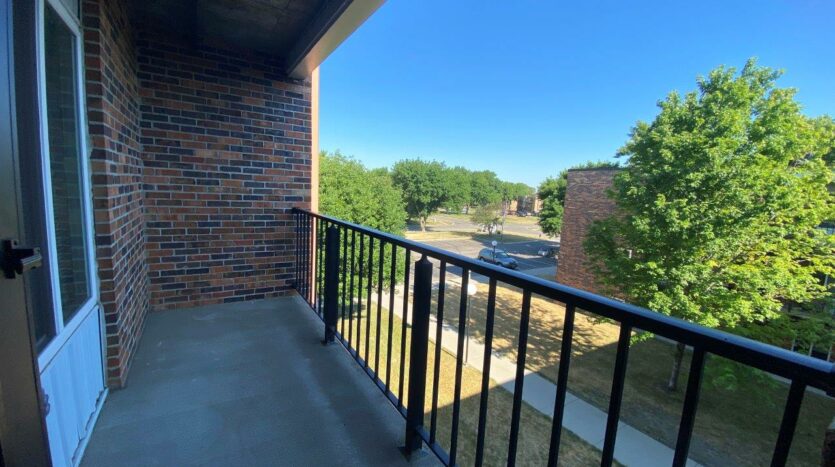 Arrowhead Apartments in Brookings, SD - Updated Apartment Balcony