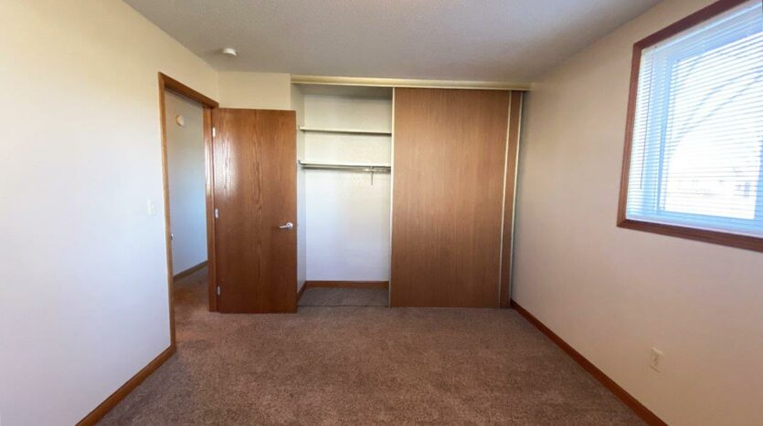 Madison Arms Apartments in Madison, SD - Bedroom 2 Closet