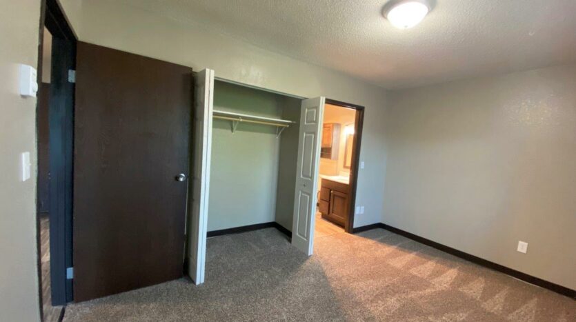 Arrowhead Apartments in Brookings, SD - Updated Apartment Bedroom Closet