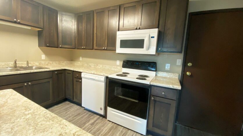 Arrowhead Apartments in Brookings, SD - Updated Apartment Kitchen2