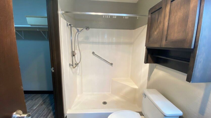 Arrowhead Apartments in Brookings, SD - Updated Apartment Bathroom Shower