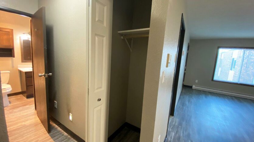 Arrowhead Apartments in Brookings, SD - Updated Apartment Front Closet