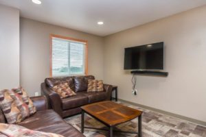 Campus Tech Apartments in Mitchell, SD - Community Room TV