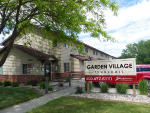 Garden Village Townhomes in Brookings, SD - Property Sign and Exterior