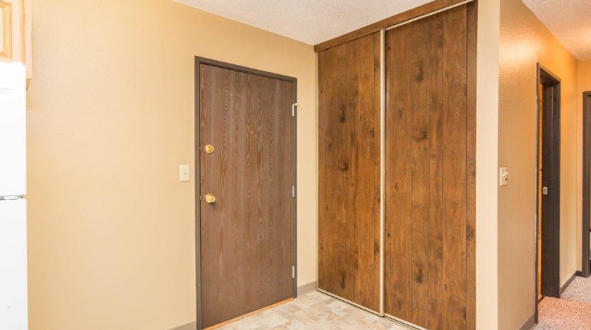 Village Square Apartments in Brookings, SD - Entry Closet