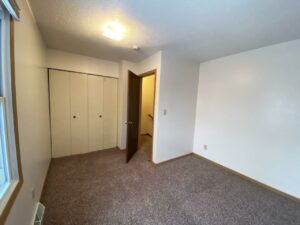 Palace Apartments & Townhomes in Mitchell, SD - 2 Bedroom Townhome Bedroom 1 Closet