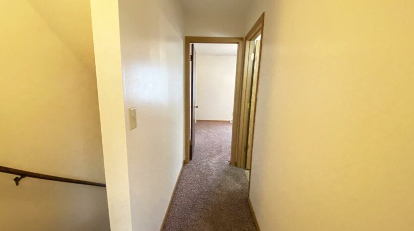 Palace Apartments & Townhomes in Mitchell, SD - 2 Bedroom Townhome Upstairs Hallway