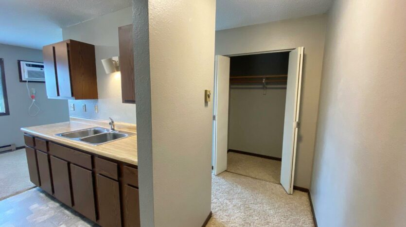 Northland Court Apartments in Mitchell, SD - Alternative 2 Bed Front Closet