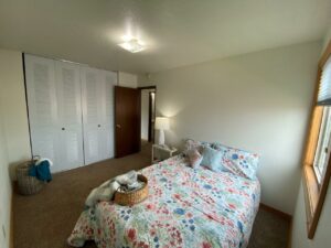 Village Pointe Apartments in Mitchell, SD - Staged Unit Bedrom 2