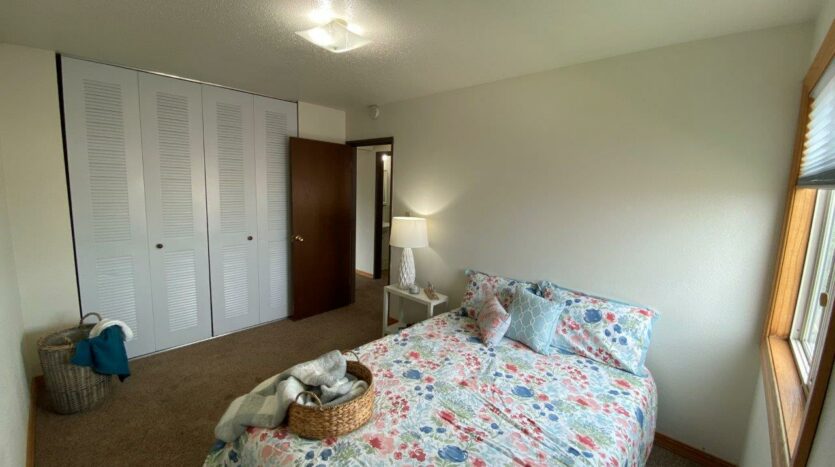 Village Pointe Apartments in Mitchell, SD - Staged Unit Bedrom 2