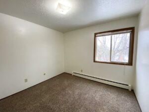 Village Pointe Apartments in Mitchell, SD - Bedroom 2