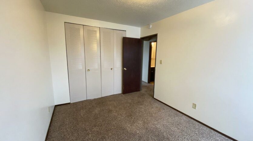 Village Pointe Apartments in Mitchell, SD - Bedroom 1 Closet