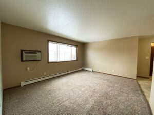 Village Pointe Apartments in Mitchell, SD - Living Room