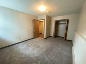 Prairie Circle Apartments in Brookings, SD - Lower Level Apartment Bedroom 2 Closet