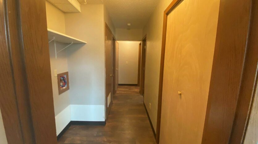 Prairie Circle Apartments in Brookings, SD - Lower Level Apartment Hallway