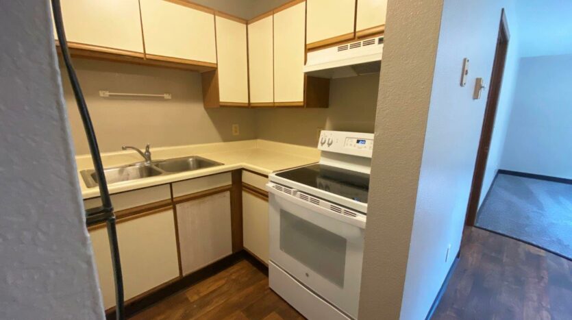 Prairie Circle Apartments in Brookings, SD - Lower Level Apartment Kitchen2