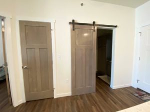 Lake Area Townhomes Phase IIB in Madison, SD - 1 Bedroom Closet and Bathroom Door