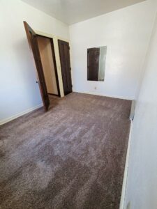 Tudor Apartments in Pierre, SD - Bedroom with Closet View