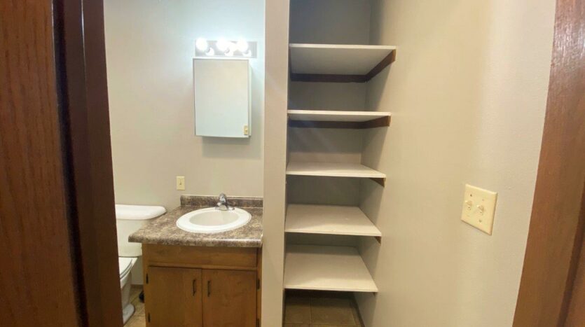 Bluestem Apartments in Canistota, SD - 1 Bedroom Apartment Bathroom Storage