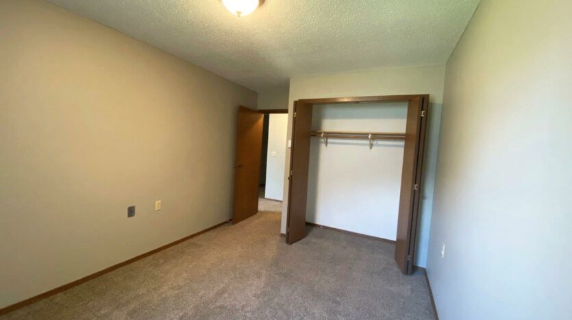 Bluestem Apartments in Canistota, SD - 1 Bedroom Apartment Bedroom Closet