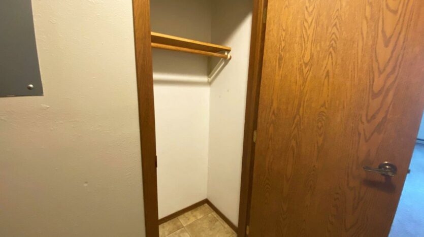 Bluestem Apartments in Canistota, SD - 1 Bedroom Apartment Front Closet