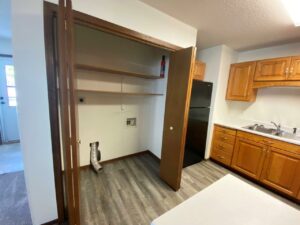 Elm Edge Townhomes in Mitchell, SD - Kitchen Closet with Washer and Dryer Hookups