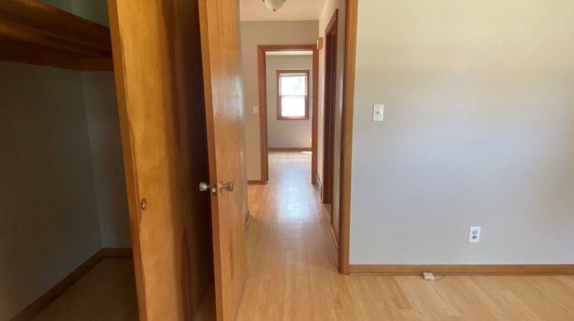 615 N Lee in Madison, SD - Downstairs Hallway to Living Room