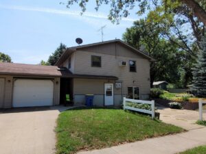 20th & State Duplex in Brookings, SD - North Entrance Patio and Single Stall Garage