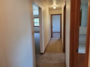 20th & State Duplex in Brookings, SD - 524 Unit Hallway to Bedrooms and Bathroom