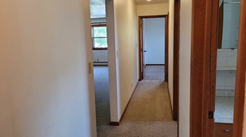 20th & State Duplex in Brookings, SD - 524 Unit Hallway to Bedrooms and Bathroom