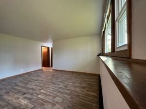 SuRa Apartments in Lake Preston, SD - Rehab Living Room