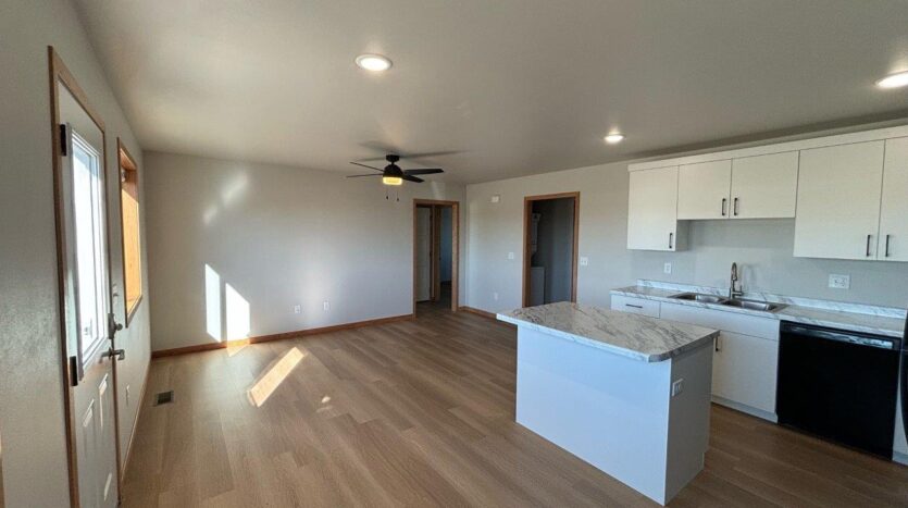 Redbird Meadows Ph I 3 Bedroom in Hayti, SD - Kitchen + Living Area