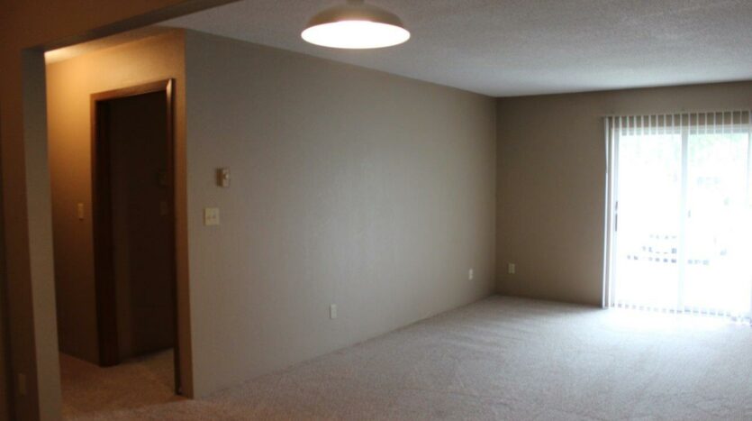 The Iron Spot in Brookings, SD - 1 Bedroom Living Room/Patio Door