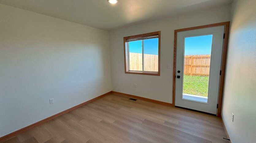 Vesper Ridge in Lake Norden, SD - Bedroom 1 + Back Patio Door