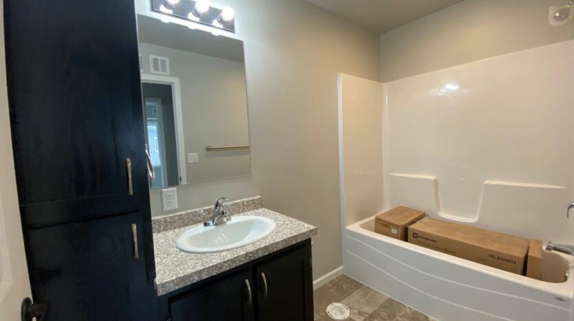 Oak Village in Aurora, SD - Bedroom 1 Bathroom 1