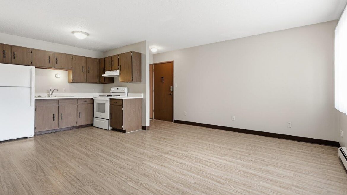 Brooks Manor Apartments in Brookings, SD - Kitchen + Entry View