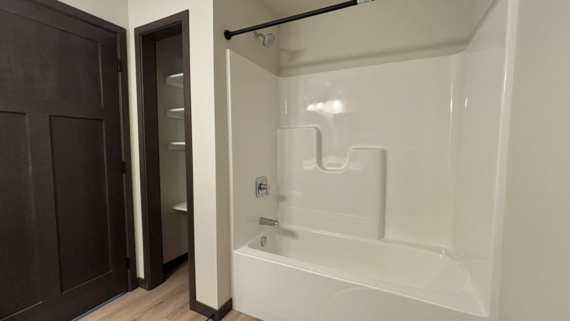 WestSide Apartments #1 Bathroom Tub + Storage
