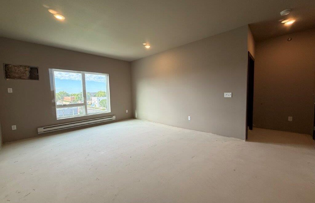 Flats on Kemp in Watertown, SD - Living Room Example
