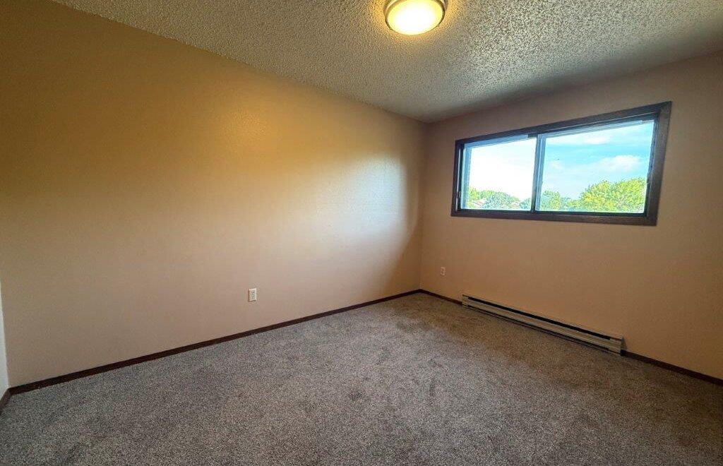Cedar Apartments in Brookings, SD - Bedroom 2 View 1