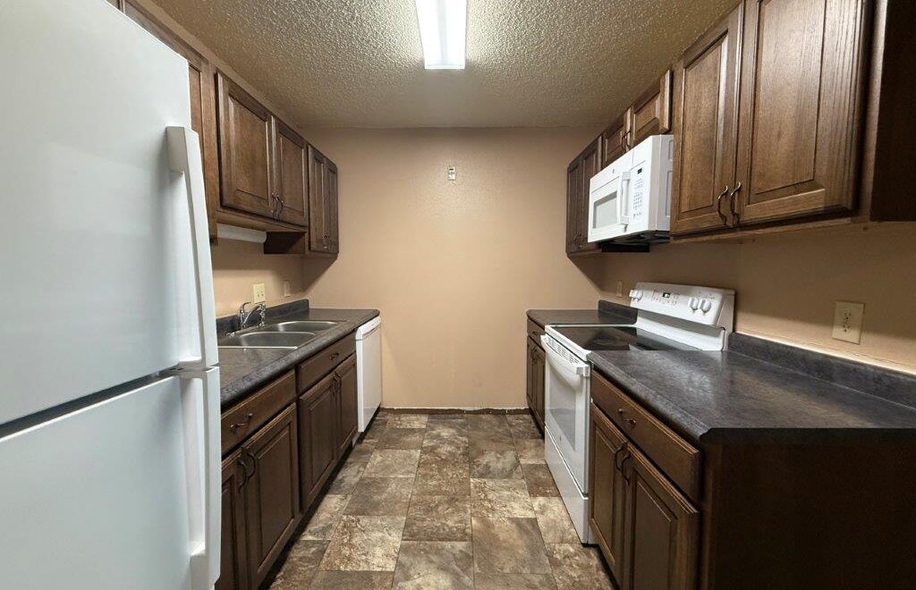 Cedar Apartments in Brookings, SD - Kitchen View 2